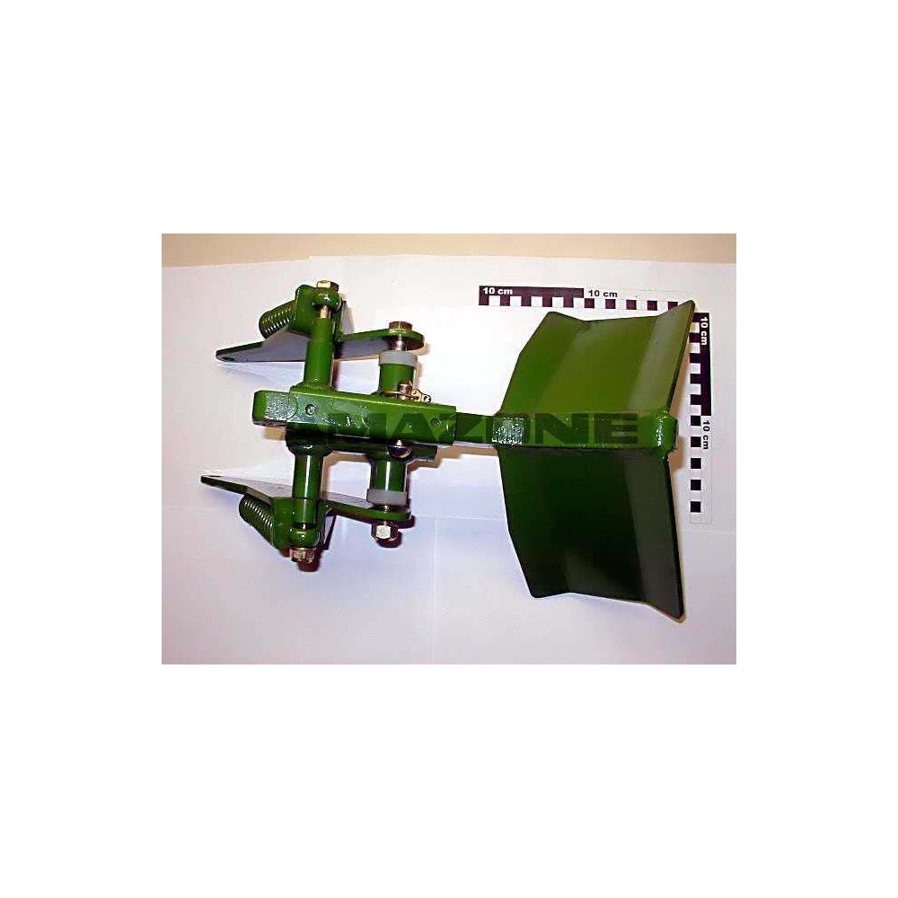 Chasse pierres et mottes sur chassi 910218 Amazone